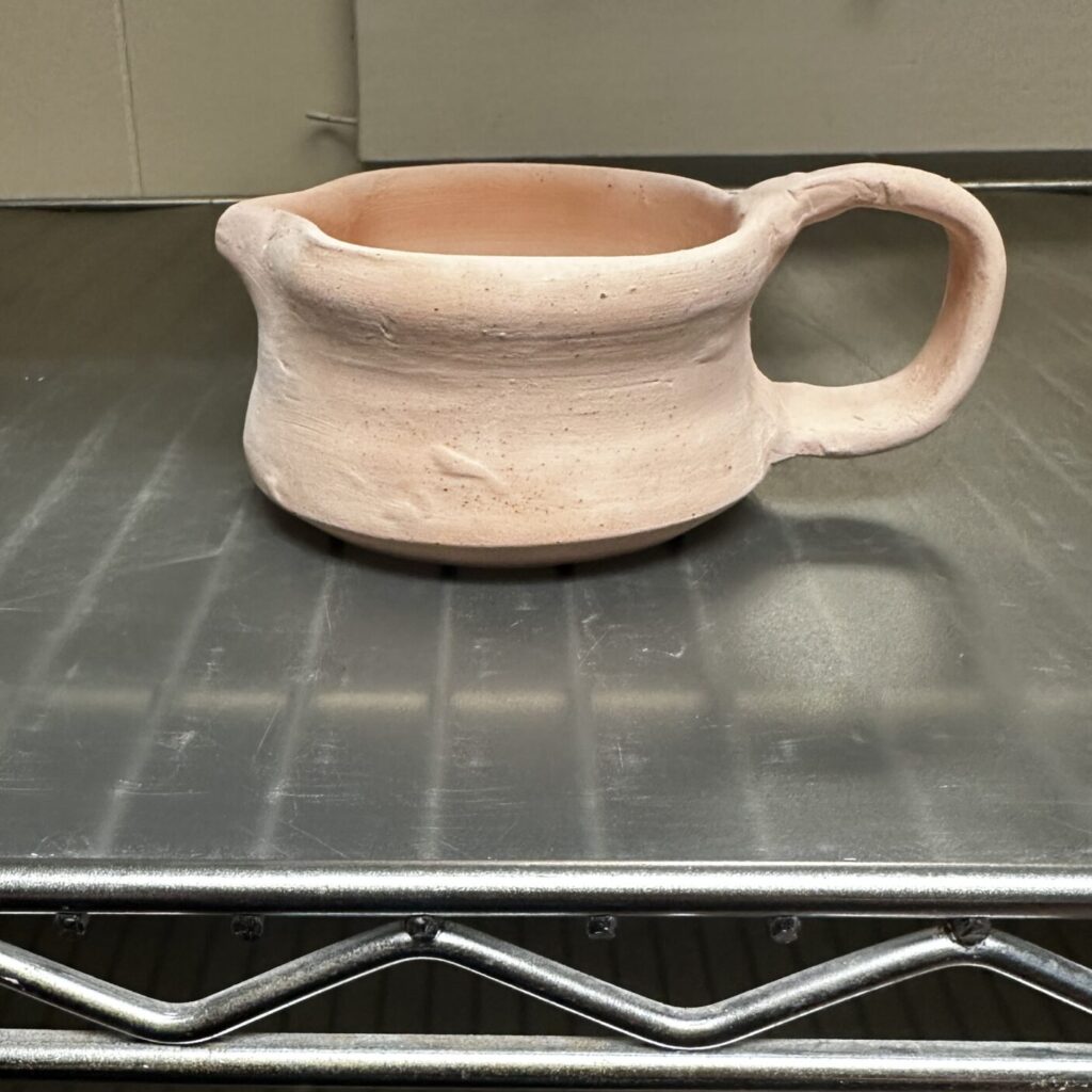 Creamer after bisque firing.